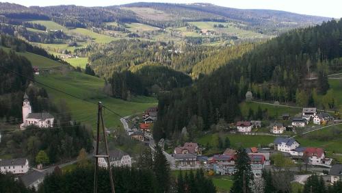 a town in a valley with a mountain at Haus Königshofer in Sankt Kathrein am Hauenstein