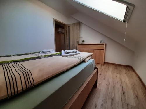 Postel nebo postele na pokoji v ubytování JuDoNa