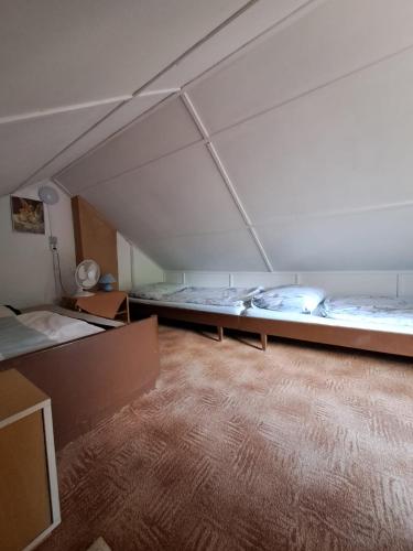 Postel nebo postele na pokoji v ubytování Apartmán Kutná Hora -Velký rybnik