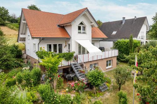 an aerial view of a house with an orange roof at im Oberdorf in Achern