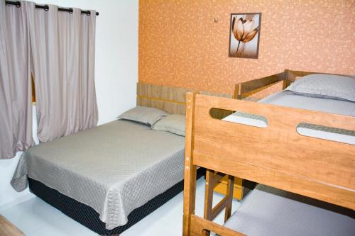 a bedroom with two beds in a room at Casa em Barreirinhas - Prime - Lençois Maranhenses - Temporada in Barreirinhas