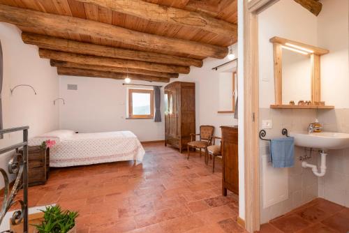 Ένα ή περισσότερα κρεβάτια σε δωμάτιο στο LA TORRE DEL MANGHEN: Agri-alloggio indipendente