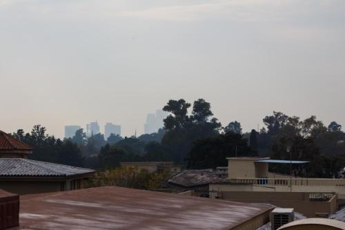 a view of a city with buildings in the background at S Chalet Islamabad in Islamabad
