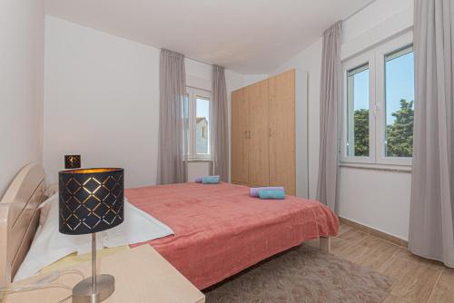 Postel nebo postele na pokoji v ubytování Holiday home Natalia