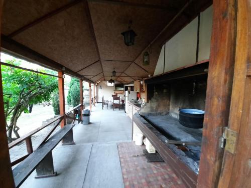 an outside view of a kitchen in a house at Pool House in Subotica