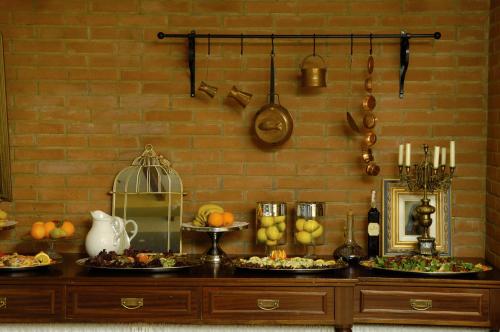 a buffet with several plates of food on it at Cleopatra Hotel in Nicosia