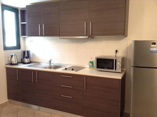 Η κουζίνα ή μικρή κουζίνα στο Johannes Boutique Apartments & Suites