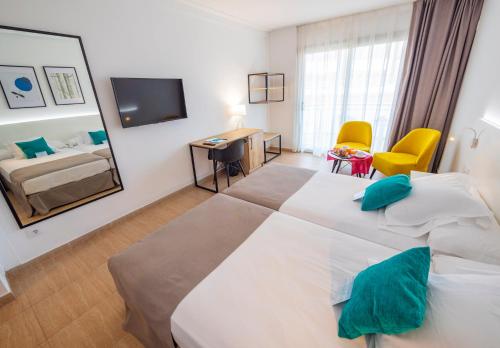 Una cama o camas en una habitación de DWO Sirius - Adults Only