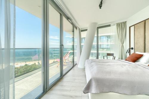 Posteľ alebo postele v izbe v ubytovaní Your Holidays Waves B862