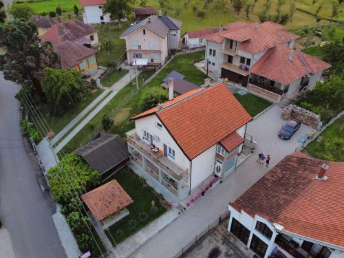 an overhead view of a house with an orange roof at Djurdja Apartment in Arandjelovac