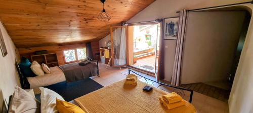 an overhead view of a room with a living room at La Terrasse d'Oléa, au coeur du village in Buis-les-Baronnies