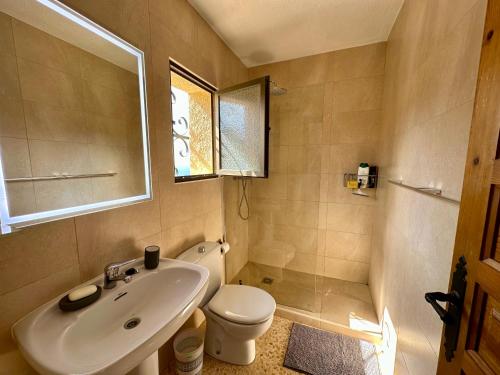 a bathroom with a sink and a toilet at Apartamento Luz ZM109 in Benitachell