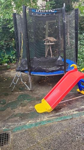 a playground with a large red and yellowintend at Dhamma-Retreat in Berlin in Berlin