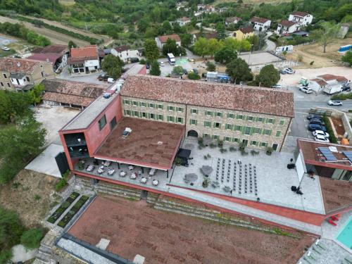 an overhead view of a large building with a parking lot at Winery & Design hotel ROXANICH in Motovun