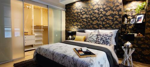 a bedroom with a bed with a table on it at Casa Relax - 500 mt. dal Centro in Turin