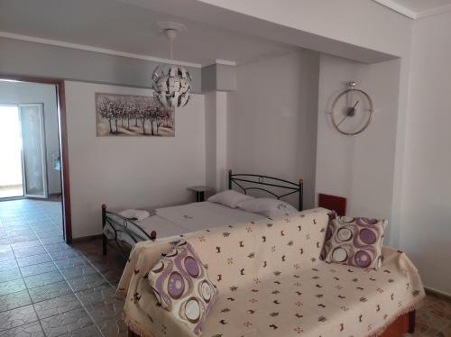 Posteľ alebo postele v izbe v ubytovaní Ki & Ki apartment 2, New Michaniona