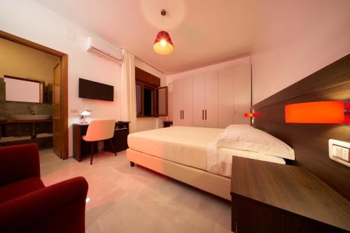 Ένα ή περισσότερα κρεβάτια σε δωμάτιο στο B&B Torre Talao
