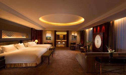Postel nebo postele na pokoji v ubytování DoubleTree by Hilton Qinghai - Golmud
