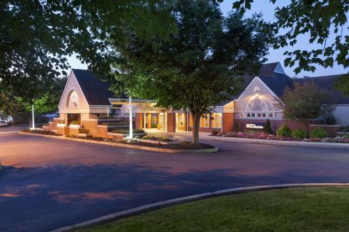a large building with a street in front of it at Hilton Garden Inn Lancaster in Lancaster