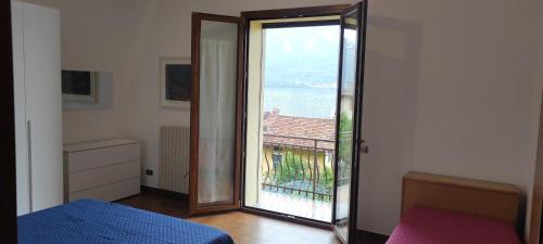 En eller flere senge i et værelse på Da Nani