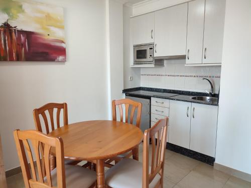 Dapur atau dapur kecil di Apartamentos Marsil