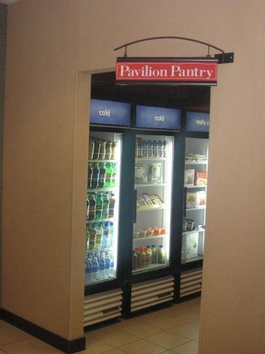 a refrigerator filled with lots of drinks in a store at Hilton Garden Inn Mankato Downtown in Mankato