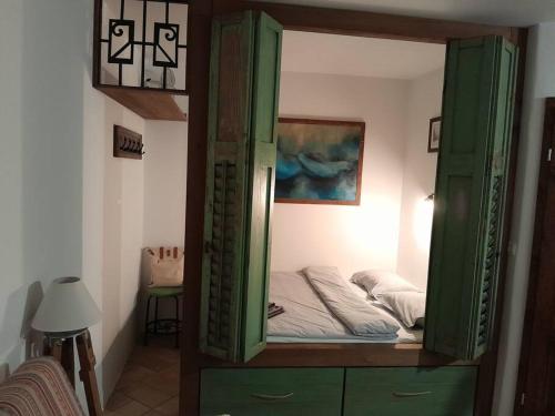 Postel nebo postele na pokoji v ubytování Studio Porta Maggiore