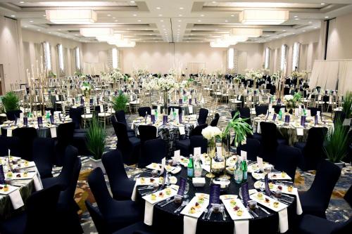 a large banquet hall with tables and chairs at DoubleTree By Hilton Baltimore North Pikesville in Pikesville