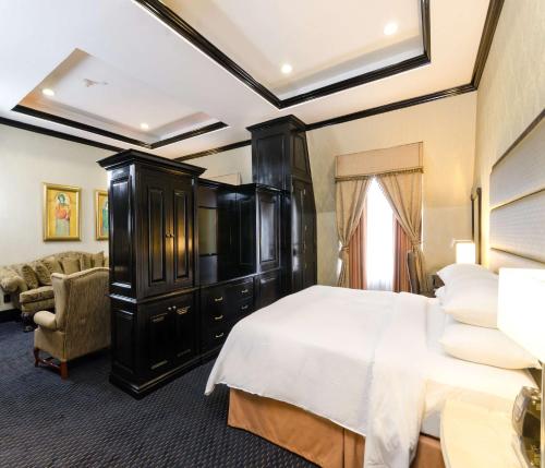 Postel nebo postele na pokoji v ubytování Hilton Princess San Pedro Sula