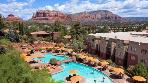 an aerial view of a resort with a pool and mountains at Hilton Sedona Resort at Bell Rock in Sedona