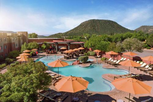 an overhead view of a resort with a pool and umbrellas at Hilton Sedona Resort at Bell Rock in Sedona