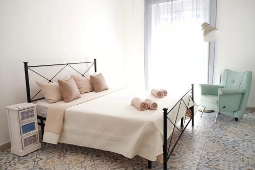 Postel nebo postele na pokoji v ubytování NERI Rooms