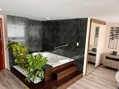 Koupelna v ubytování Hotel Ambato