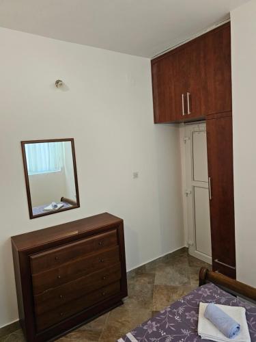 Postel nebo postele na pokoji v ubytování Apartmani Vanja 1