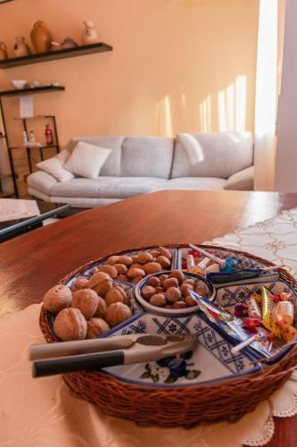 a bowl of food on a table in a living room at Terra di Mezzo in Castellanza