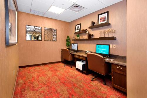 an office with a desk with chairs and a computer at Hampton Inn Butler in Butler
