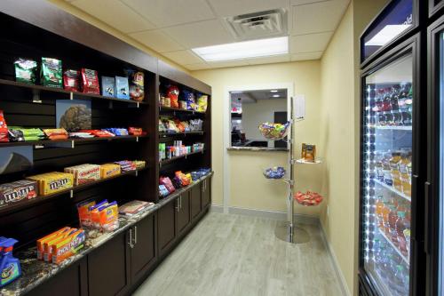 a store aisle with shelves of food at Hampton Inn Richland/South Jackson in Richland