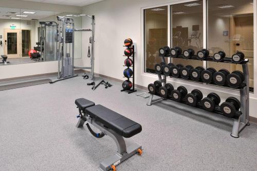 a gym with a lot of dumbbells and other equipment at Homewood Suites by Hilton Columbia/Laurel in Laurel