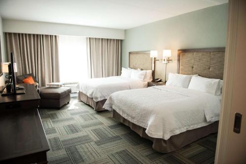 Ein Bett oder Betten in einem Zimmer der Unterkunft Hampton Inn Bainbridge, GA