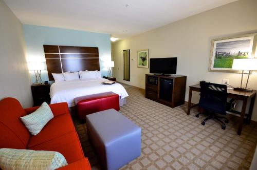 TV a/nebo společenská místnost v ubytování Hampton Inn and Suites Hutto