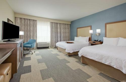 Ένα ή περισσότερα κρεβάτια σε δωμάτιο στο Hampton Inn and Suites Snyder