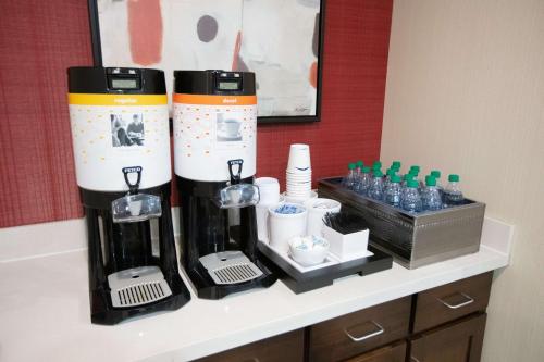 a coffee machine on a counter in a room at Hampton Inn Toledo Oregon in Oregon