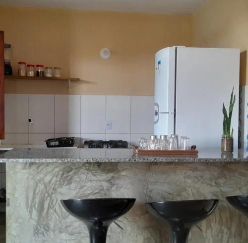 Kuchyň nebo kuchyňský kout v ubytování Pousada Mar de Mamoã
