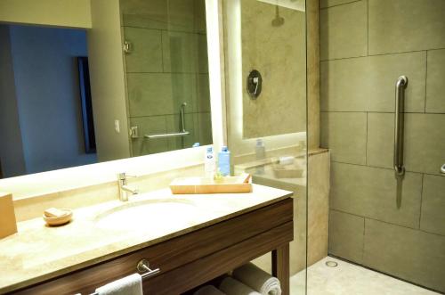 a bathroom with a sink and a shower at Hampton Inn by Hilton Durango in Durango