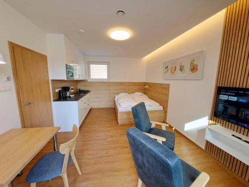 Postel nebo postele na pokoji v ubytování 6bits Apartments