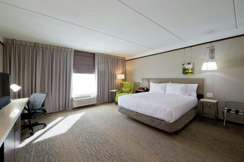Ένα ή περισσότερα κρεβάτια σε δωμάτιο στο Hilton Garden Inn Martinsburg