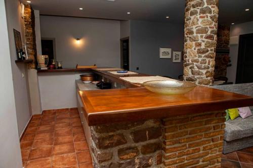 a kitchen with a counter with a bowl on it at Barhouse in Katsíngrion