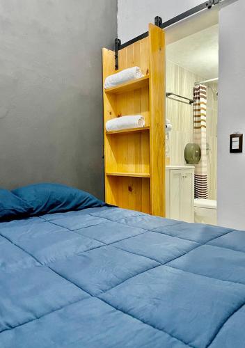Ένα ή περισσότερα κρεβάτια σε δωμάτιο στο Casa céntrica con garaje