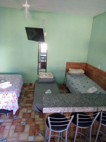 Katil atau katil-katil dalam bilik di Águas de Carrancas FLATS