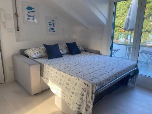 Postel nebo postele na pokoji v ubytování DIANO Design&Suite Jeans